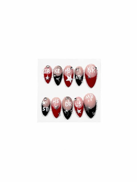 Red and black nails with personalized letters, stars and hearts
