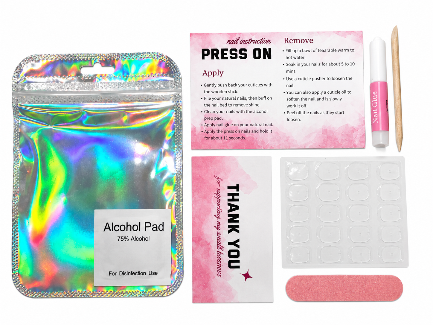 Nail application kit showing pouch, glue, adhesive tabs, file, cuticle stick, alcohol pad and instruction cards